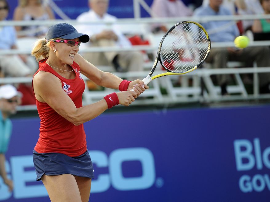 Washington Kastles' Anastasia Rodionova returns the ball against the New York Sportimes during a World TeamTennis mixed doubles match, Thursday, July 12, 2012, in Washington. (AP Photo/Nick Wass)