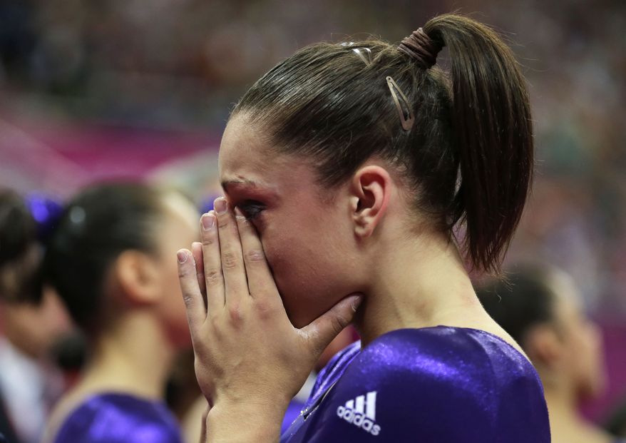 U.S. gymnast Jordyn Wieber cries after she failed to qualify for the women's all-around finals during the Artistic Gymnastics women's qualification at the 2012 Summer Olympics, Sunday, July 29, 2012, in London. (AP Photo/Gregory Bull)