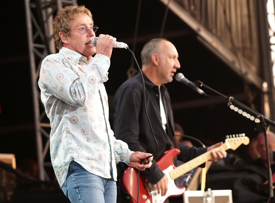 ** FILE ** In this July 2, 2006, file photo, Roger Daltrey, left, and Pete Townshend of The Who perform at the Hyde Park music festival, London, July 19, 2012. (AP Photo/ Max Nash)