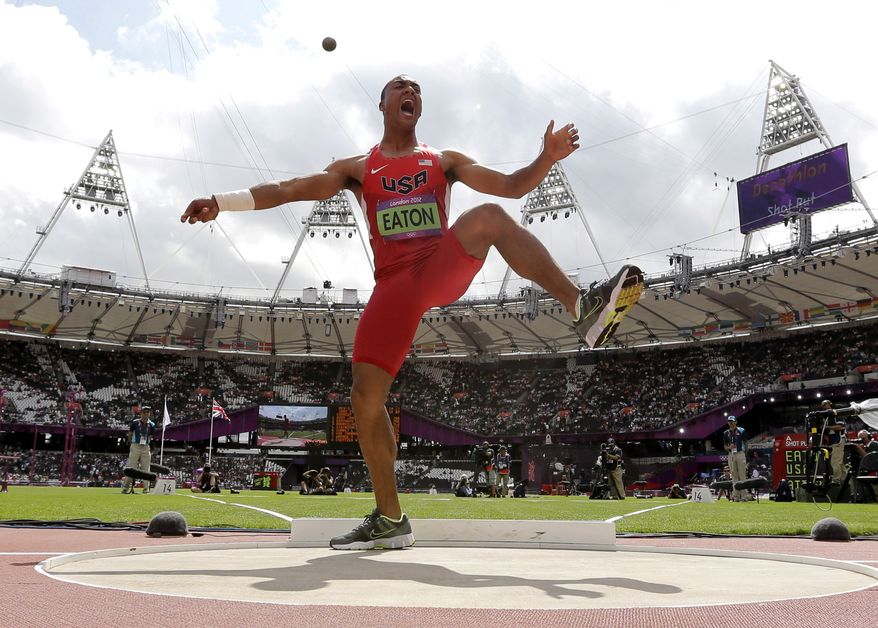 United States' Ashton Eaton reacts Aug. 8, 2012, after his throw in the shot put during the decathlon at the Olympic Stadium in London. (Associated Press)