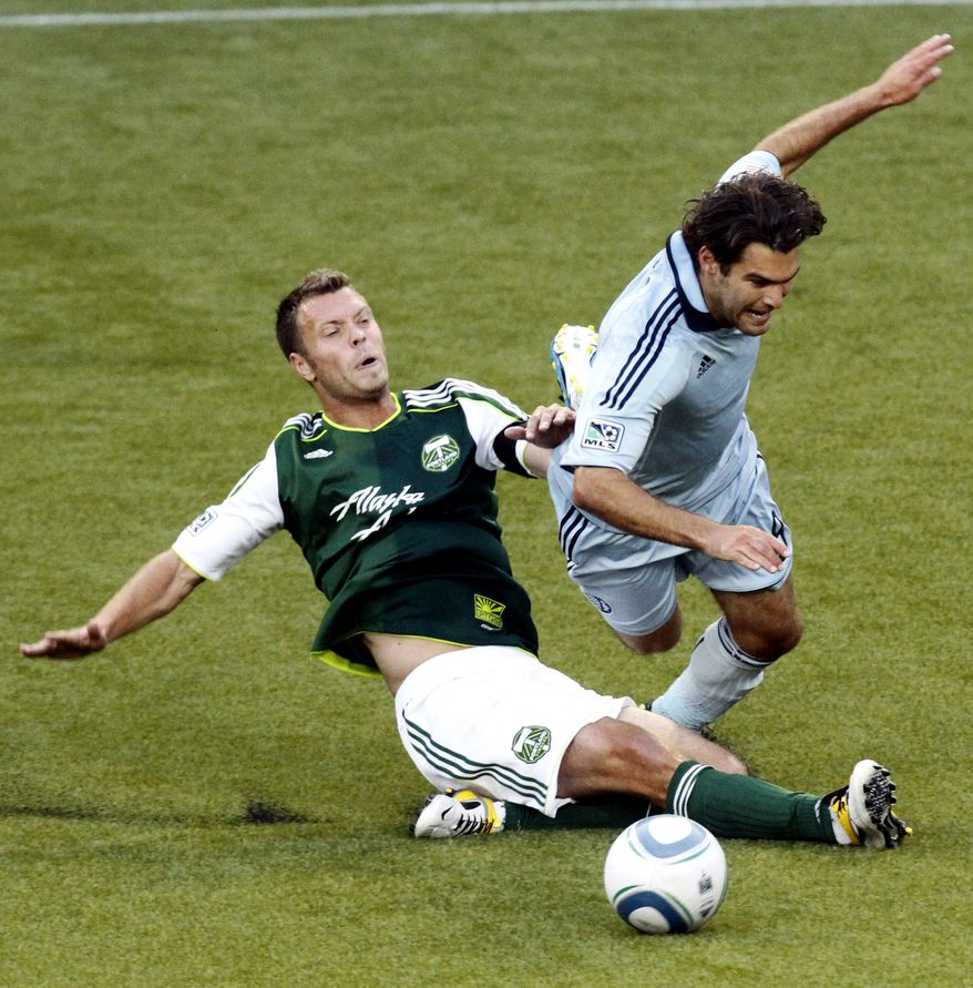 Sporting Kansas City's Graham Zusi (right) had a goal and an assist in his team's 2-1 win over D.C. United on Saturday. (AP Photo/Don Ryan, File)