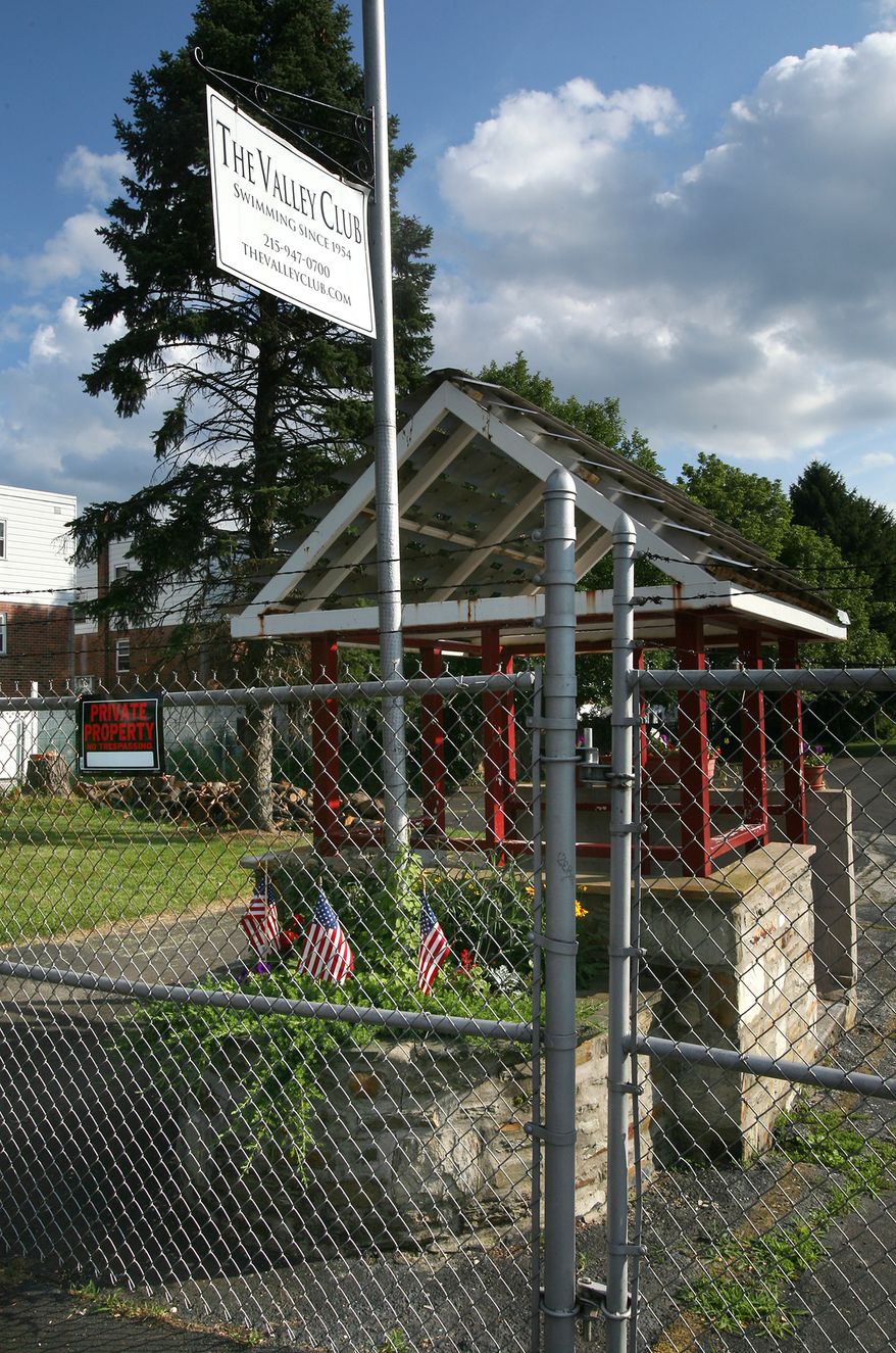 **FILE** The front gate to the Valley Club in Huntingdon Valley, Pa., is locked in this photo from July 9, 2009. (Associated Press)