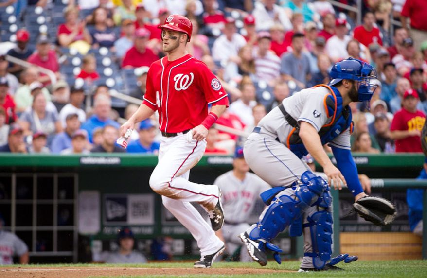 Washington Nationals Bryce Harper scores on a Ryan Zimmerman RBI single bottom of the third inning. (Rod Lamkey Jr./The Washington Times)