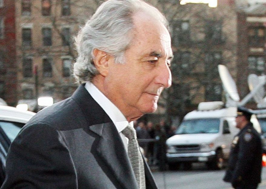 Bernard Madoff is serving a 150-year prison term for his Ponzi scheme that stole an estimated $36 billion from investors. (Associated Press) ** FILE **