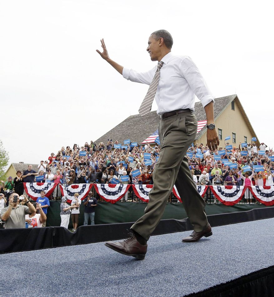 President Obama gets a warm greeting as he walks on stage for a campaign rally Saturday in Urbandale, Iowa. After four years, Americans have had a chance to get to know his personality, tastes and foibles. (Associated Press)