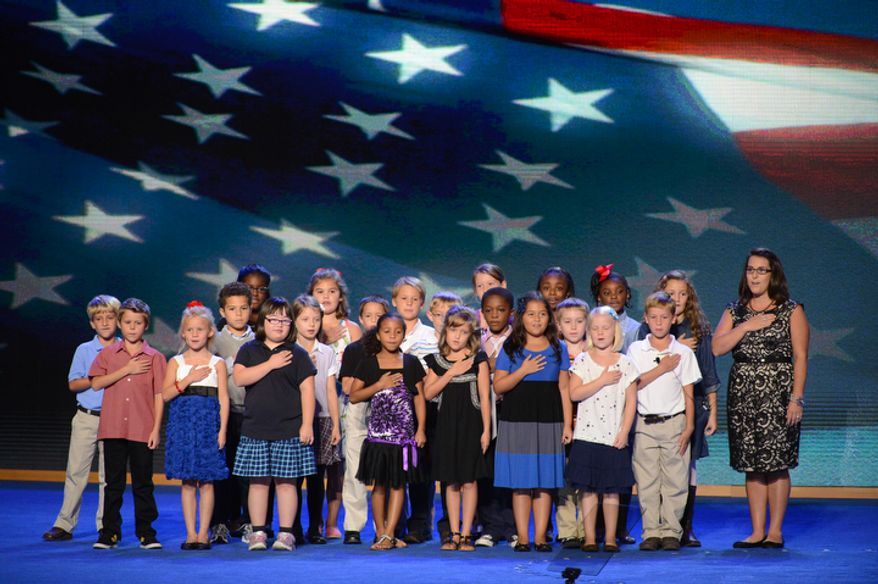 The third-grade class of the W.R. O'Dell Elementary School in Concord, N.C., recite the Pledge of Allegiance at the opening of the Democratic National Convention in Charlotte, N.C., on Tuesday, Sept. 4, 2012. (Andrew Geraci/The Washington Times)