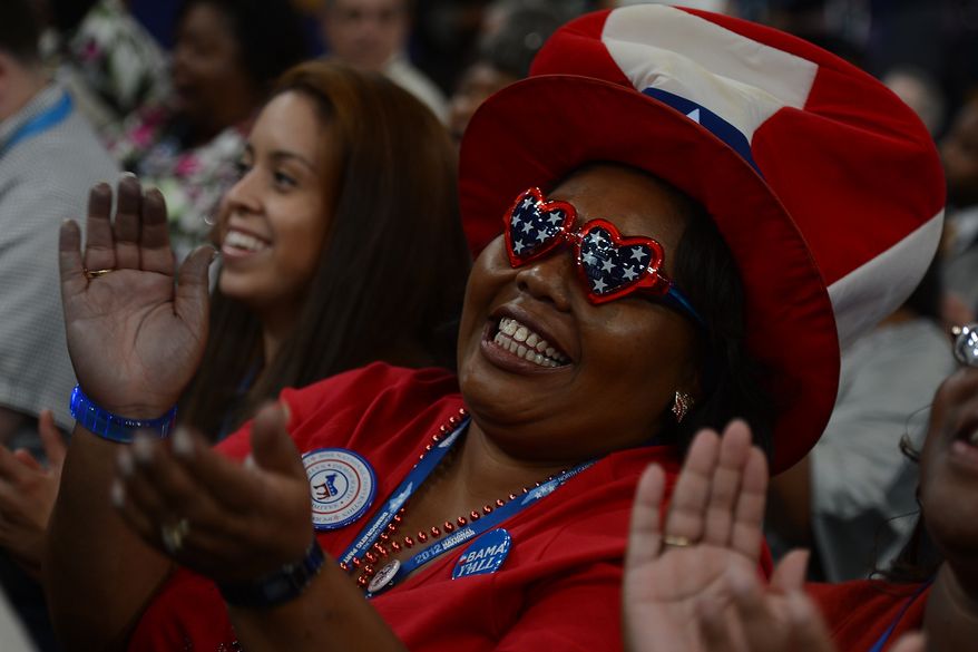North Carolina delegate Tiffany Powers of Lumberton, N.C., applauds a speech at the Democratic National Convention at the Time Warner Arena in Charlotte, N.C., on Wednesday, September 5, 2012. (Barbara Salisbury/ The Washington Times)