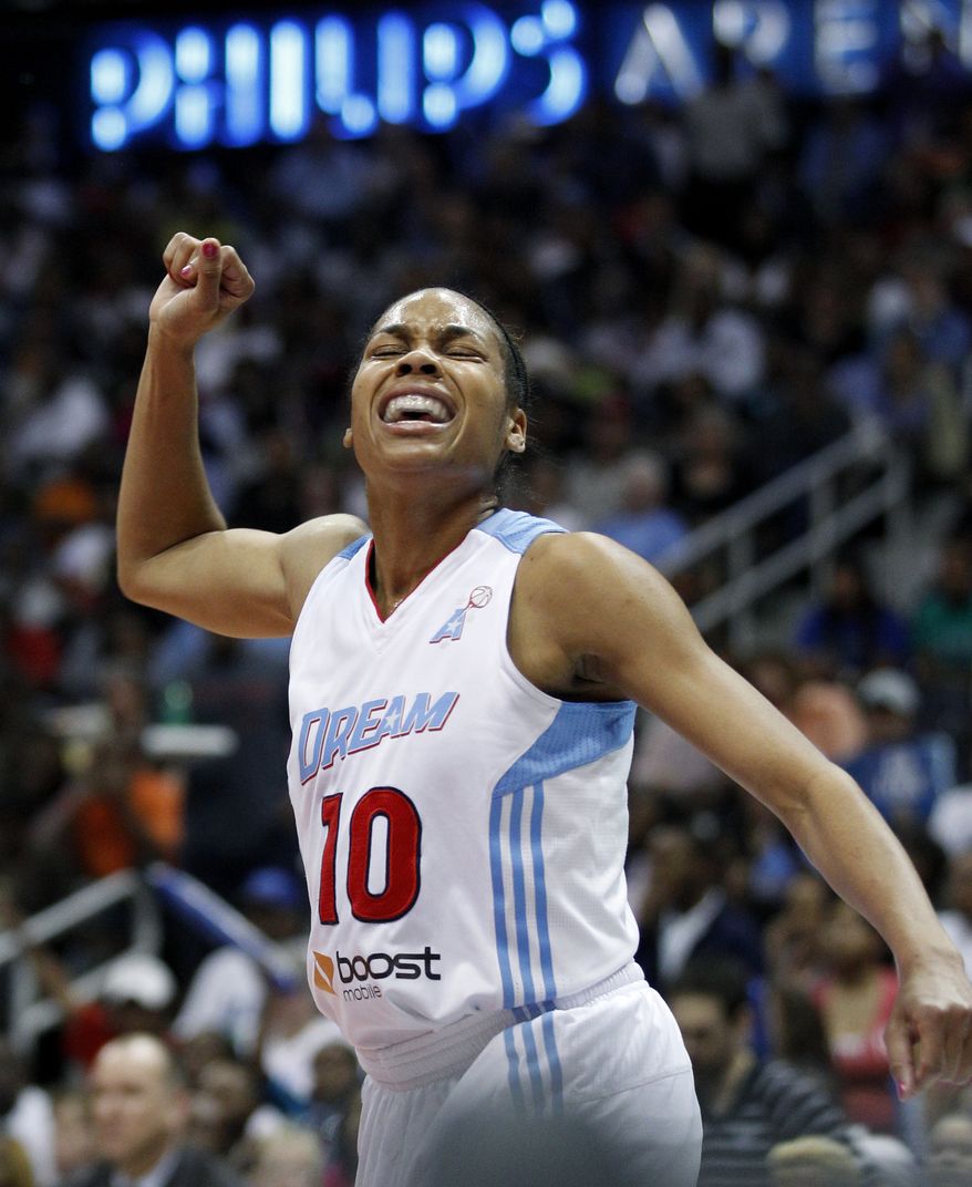 FILE - Atlanta Dream guard Lindsey Harding reacts after a loose ball foul is called on the Minnesota Lynx during the first quarter of Game 3 of the WNBA basketball finals in this Oct. 7, 2011 file photo taken in Atlanta. Harding took a break from basketball this past winter and spent the WNBA offseason doing some running. The Atlanta Dream guard trained for some long-distance runs and competed in three half-marathons inFeb. and March 2012. (AP Photo/David Goldman)