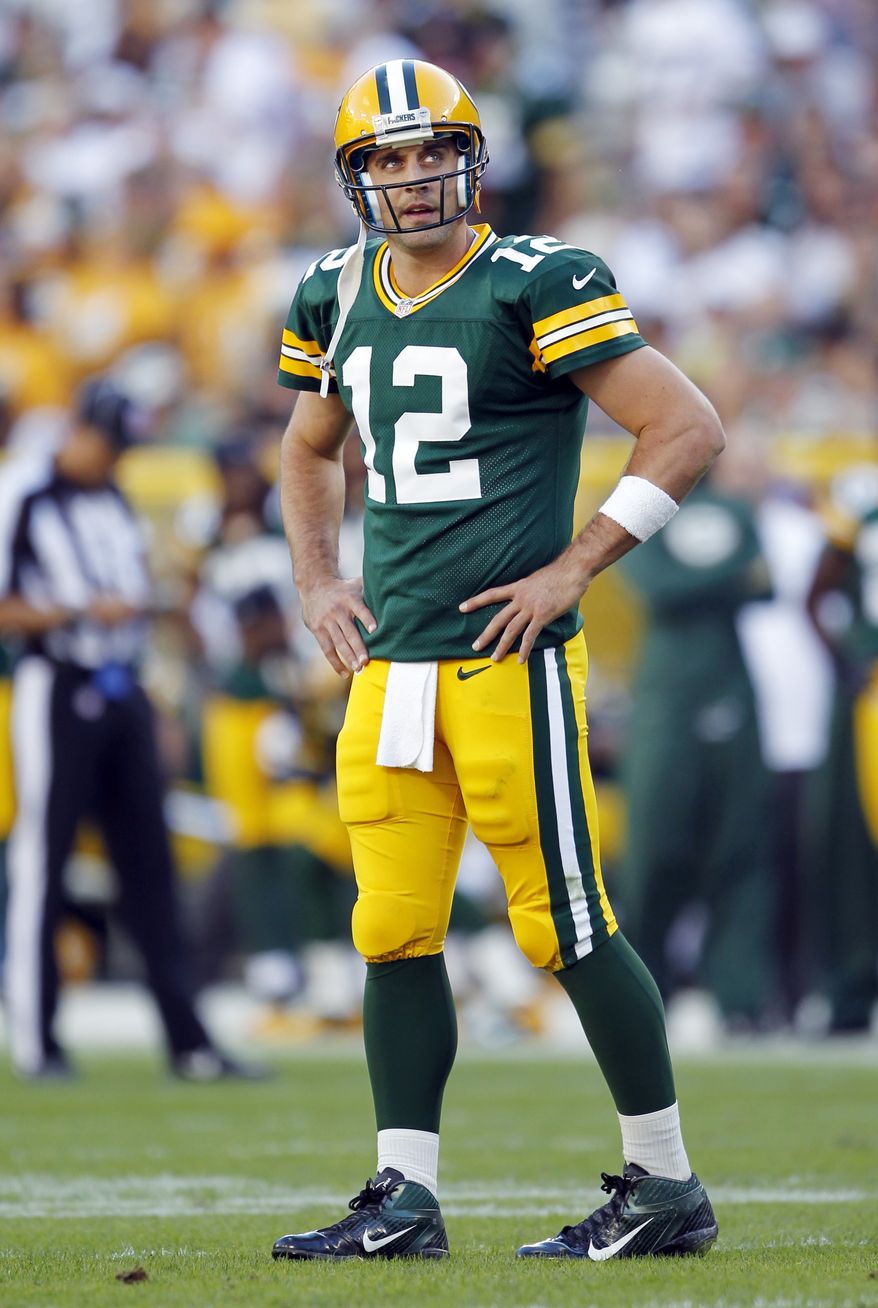 Green Bay Packers' Aaron Rodgers reacts during the second half of an NFL football game against the San Francisco 49ers Sunday, Sept. 9, 2012, in Green Bay, Wis. The 49ers won 30-22. (AP Photo/Mike Roemer)