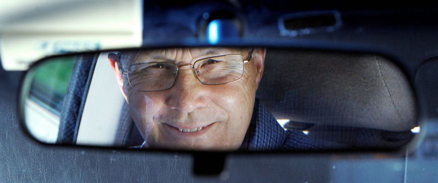 Jerry Wiseman is reflected in the rearview mirror, in Schaumburg, Ill. Mr. Wiseman and his wife, Sandy, took refresher driving classes to help them stay safe behind the wheel for many more years. Mr. Wiseman learned exercises to improve his flexibility for checking blind spots when turning. He takes extra care with left-hand turns, which become riskier as the ability to judge speed and distance wanes with age. Thirty states and the District of Columbia have special requirements for older drivers. (Associated Press)