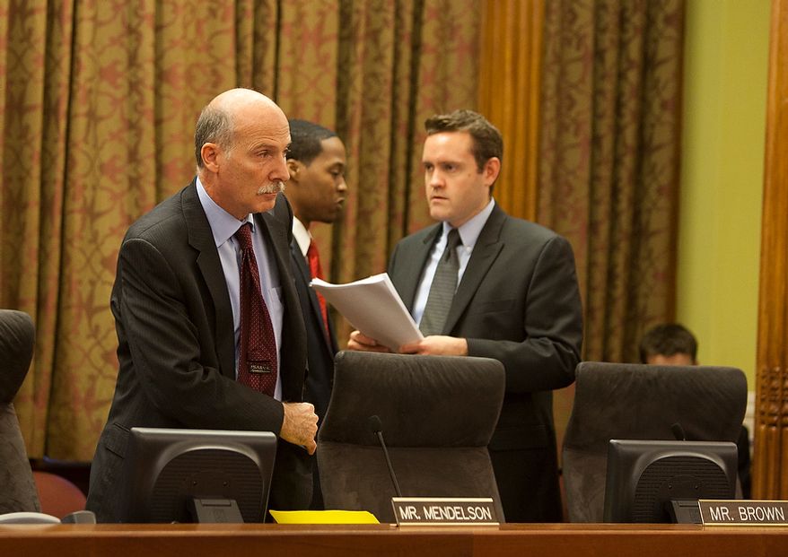 D.C. City Council Chairman, Phil Mendelson, takes his seat before the 42nd legislative meeting of City Council period 19 after summer recess. Wednesday, Sept. 19, 2012, in Washington, DC. (Craig Bisacre/The Washington Times)