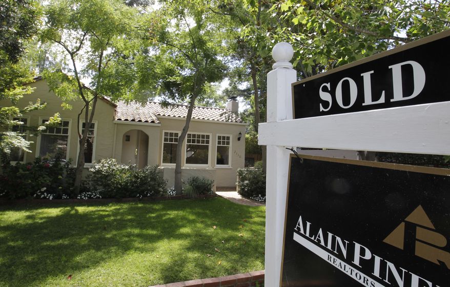 **FILE** An exterior view of a home sold in Palo Alto, Calif., is seen here Aug. 21, 2012. (Associated Press)