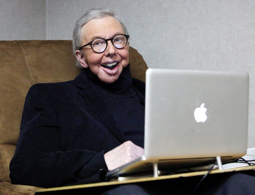 Pulitzer Prize-winning movie critic Roger Ebert works in his office at the WTTW-TV studios in Chicago in January 2011. (Associated Press)