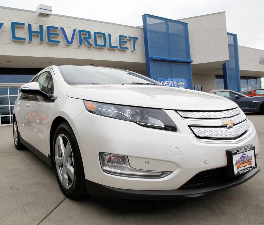 A 2012 Chevrolet Volt is featured at a dealership in the south Denver suburb of Englewood, Colo. Sales of the Volt set a monthly record of 2,800 in August, mostly due to steep discounts. (Associated Press)