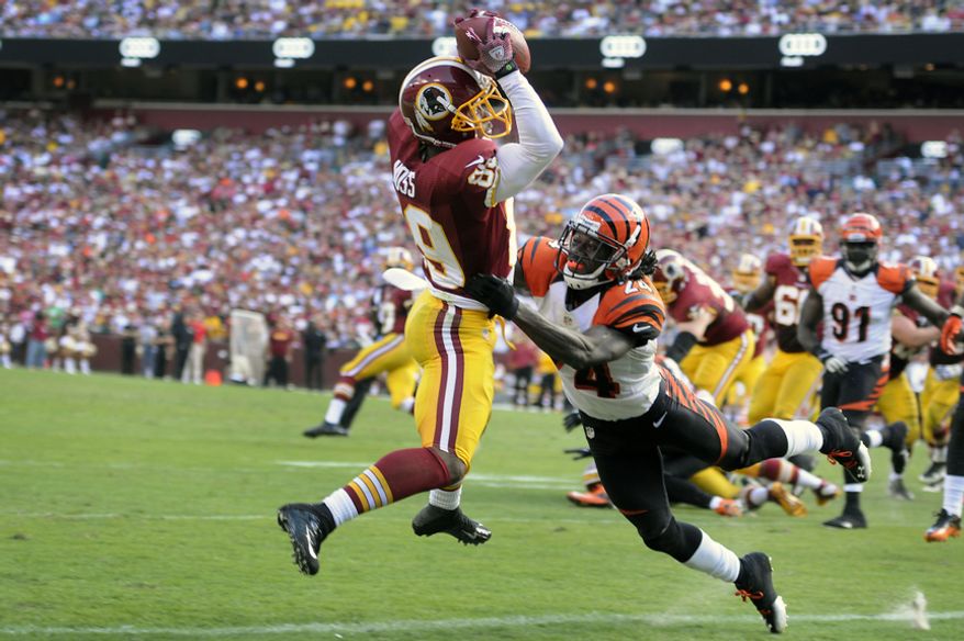 Washington Redskins wide receiver Santana Moss (89) hauls in a third quarter touchdown in front of Cincinnati Bengals cornerback Adam Jones (24) at FedEx Field, Landover, Md., Sep. 23, 2012. (Preston Keres/Special to The Washington Times)