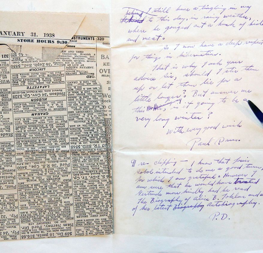 A letter and newspaper clipping sent to Ernest Hemingway by writer Paul Drus is part of the collection under the care of conservators. (Associated Press)