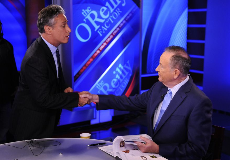 ** FILE ** Comedy Central's Jon Stewart (left) and Bill O'Reilly of Fox News tape an interview in New York in September 2010. (AP Photo/Peter Kramer)