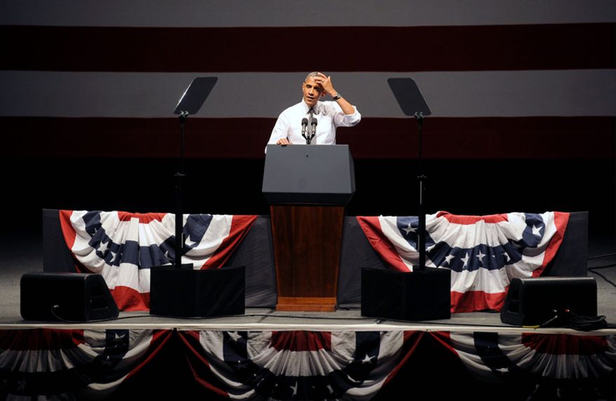 President Obama speaks during a campaign event on Monday, Oct. 8, 2012, in San Francisco. John Legend and Michael Franti performed at the event. (AP Photo/Noah Berger)