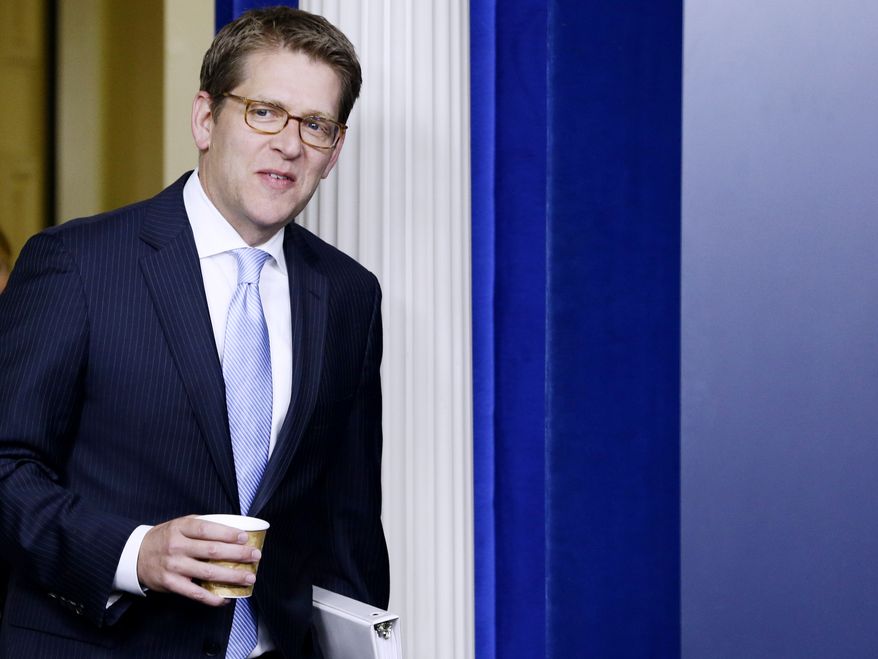 White House press secretary Jay Carney arrives to brief reporters at the White House in Washington on Wednesday, Oct. 10, 2012. (AP Photo/Charles Dharapak)