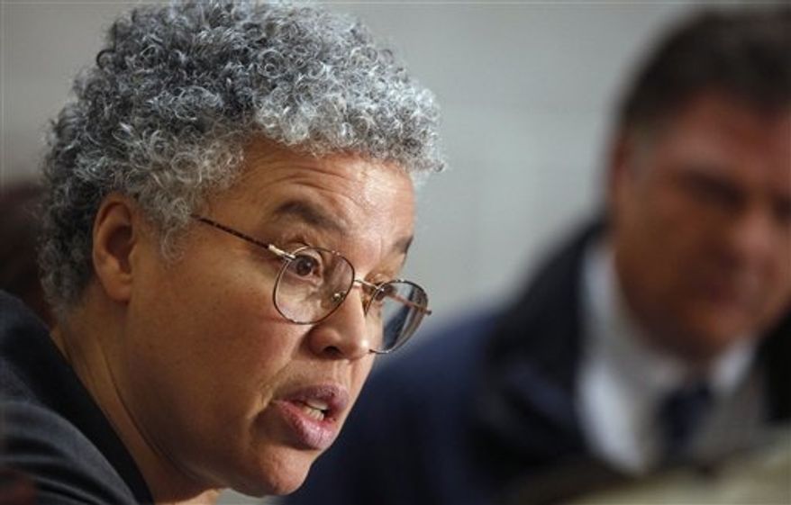** FILE ** In this Jan. 26, 2012, file photo, Cook County Board President Toni Preckwinkle speaks at a news conference in Chicago. (AP Photo/M. Spencer Green, File)