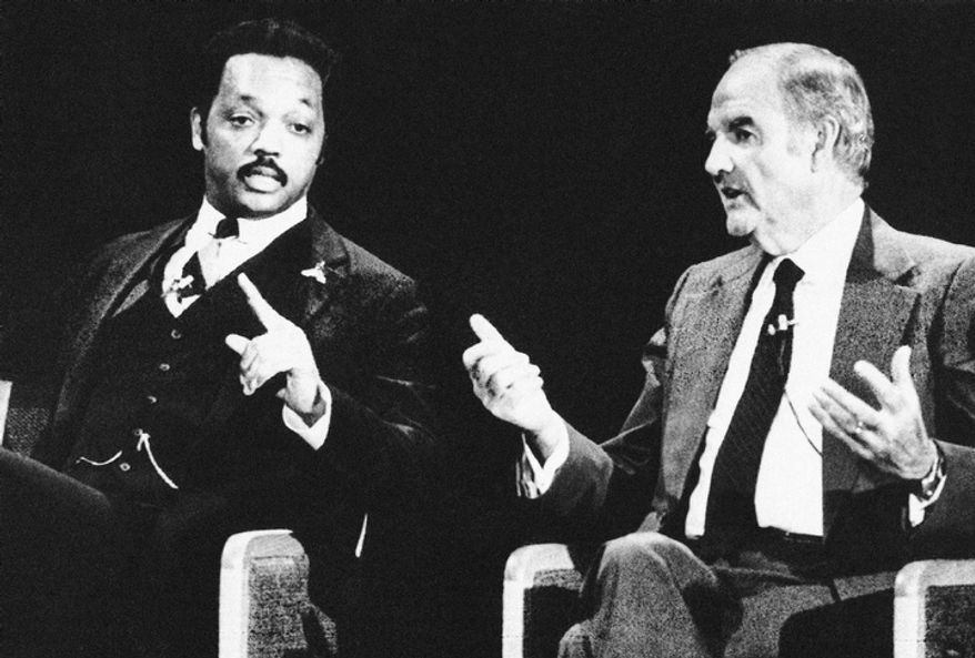 In this Feb. 23, 1984 file photo, Rev. Jesse Jackson, left, and former Sen. George McGovern both gesture during the Democratic presidential debate in Manchester, N.H. A family spokesman says, McGovern, the Democrat who lost to President Richard Nixon in 1972 in a historic landslide, has died at the age of 90. According to the spokesman, McGovern died Sunday, Oct. 21, 2012 at a hospice in Sioux Falls, surrounded by family and friends.(AP Photo, File)