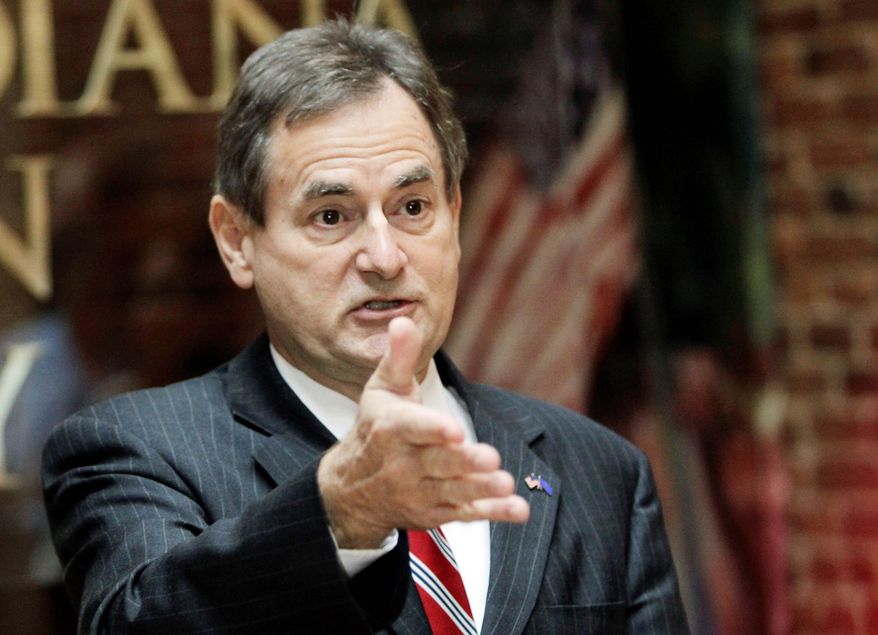 Indiana Republican Senate candidate Richard Mourdock makes a point in Indianapolis on Wednesday, at a news conference at which he sought to clarify what he meant by remarks on rape he made in a debate the night before. (Associated Press)