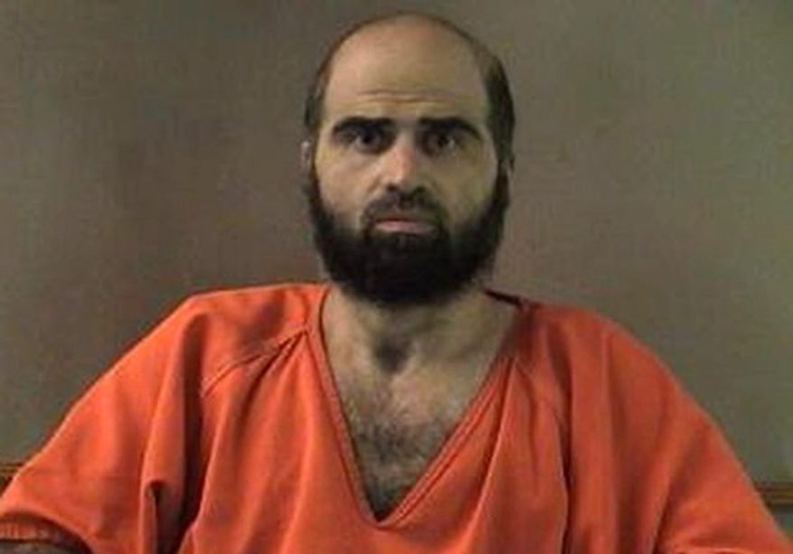 An Army appeals court will hear arguments on Thursday, Oct. 11, 2012, in the case of Maj. Nidal Hasan, the Army psychiatrist charged in the deadly 2009 Fort Hood shooting rampage, over whether Maj. Hasan will be required to have his beard shaved before his court-martial. The issue has indefinitely postponed his murder trial. Maj. Hasan argues that the order violates his religious rights. (AP Photo/Bell County Sheriff's Department via The Temple Daily Telegram)