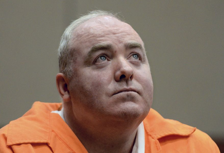 ** FILE ** Michael Skakel looks up while listening to a statement from John Moxley, brother of victim Martha Moxley, in court in Middletown, Conn., on Tuesday, Jan. 24, 2012. (AP Photo/Jessica Hill, Pool)