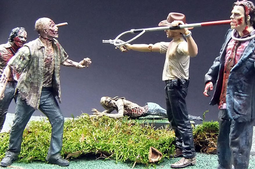 McFarlane Toys' Deputy Rick Grimes is surrounded by zombies from The Walking Dead action figure collection. (Photograph by Joseph Szadkowski / The Washington Times)