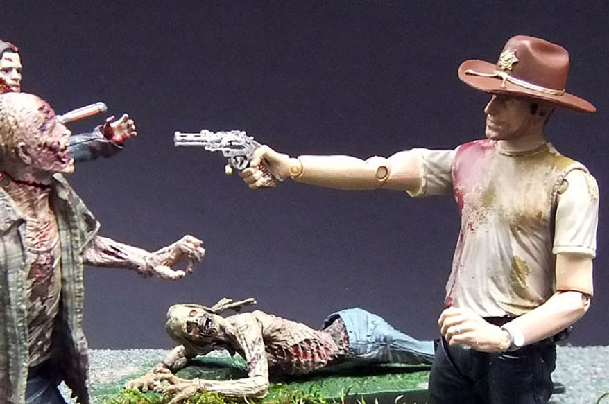 McFarlane Toys' Deputy Rick Grimes fights back against The Walking Dead. (Photograph by Joseph Szadkowski / The Washington Times)
