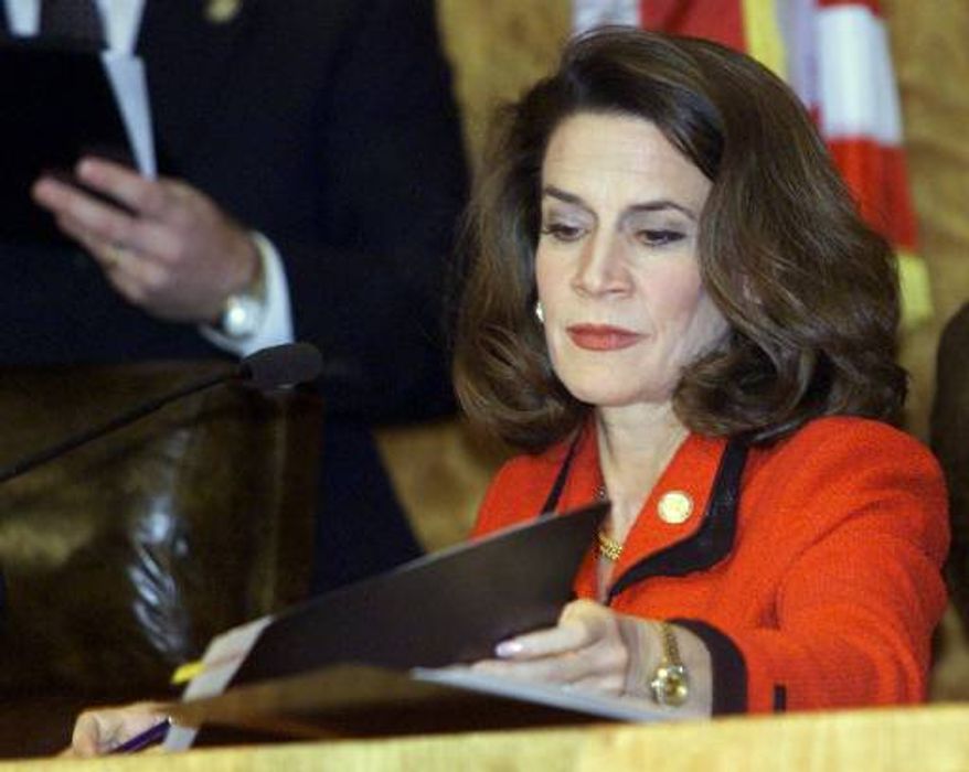 Florida Secretary of State Katherine Harris certifies the state's election during a news conference on Sunday, Nov. 26, 2000, in Tallahassee, Fla. (AP Photo/Beth A. Keiser)