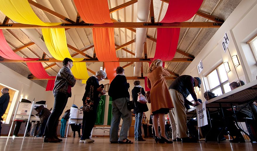 Constituents wait in line to cast their votes during the lunch time hours at Wesley Methodist Church, precinct 32, Washington, D.C., Tuesday, Nov. 6, 2012 (Craig Bisacre/The Washington Times)