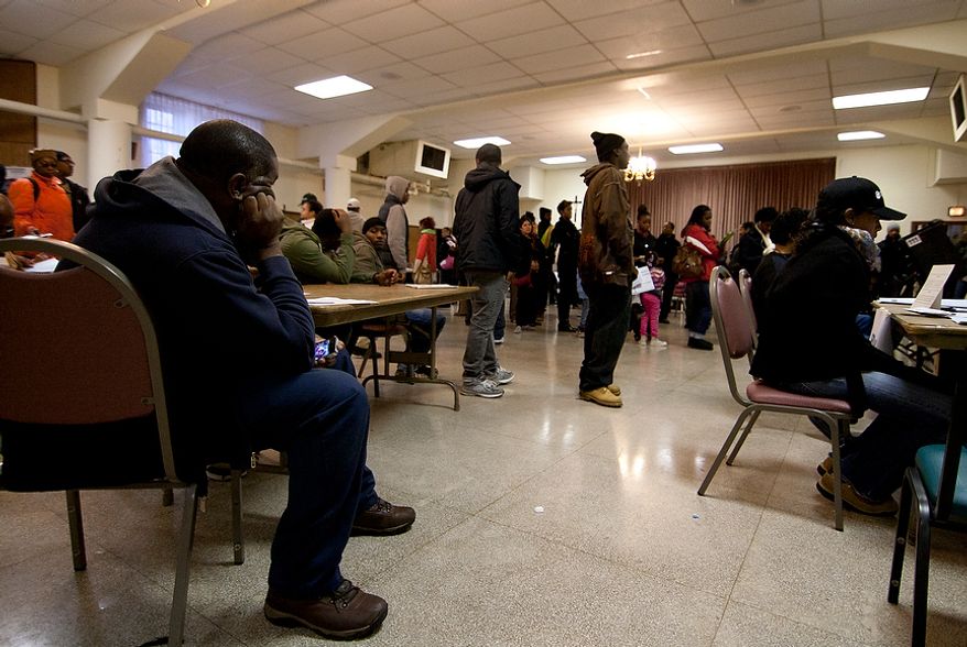 Voters wait in long lines to cast their ballots at St. Francis Church, precinct 111 polling site in Washington, D.C., to cast their vote, Tuesday, Nov. 6, 2012 (Craig Bisacre/The Washington Times)
