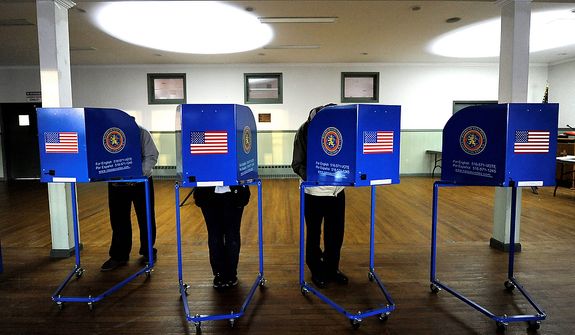 Early morning voting is under way at Bishop Molloy Recreational Center on Tuesday, Nov. 6, 2012, in Point Lookout, N.Y., one of several voting locations that were created as a result of superstorm Sandy. (AP Photo/Kathy Kmonicek)