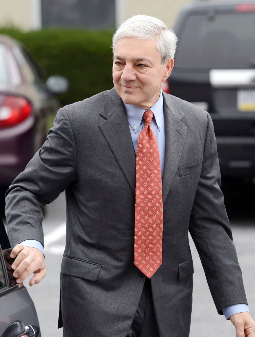 ** FILE ** In this Nov. 7, 2012, former Penn State president Graham Spanier arrives at the office of a Harrisburg District Court judge in Harrisburg, Pa. (Associated Press)