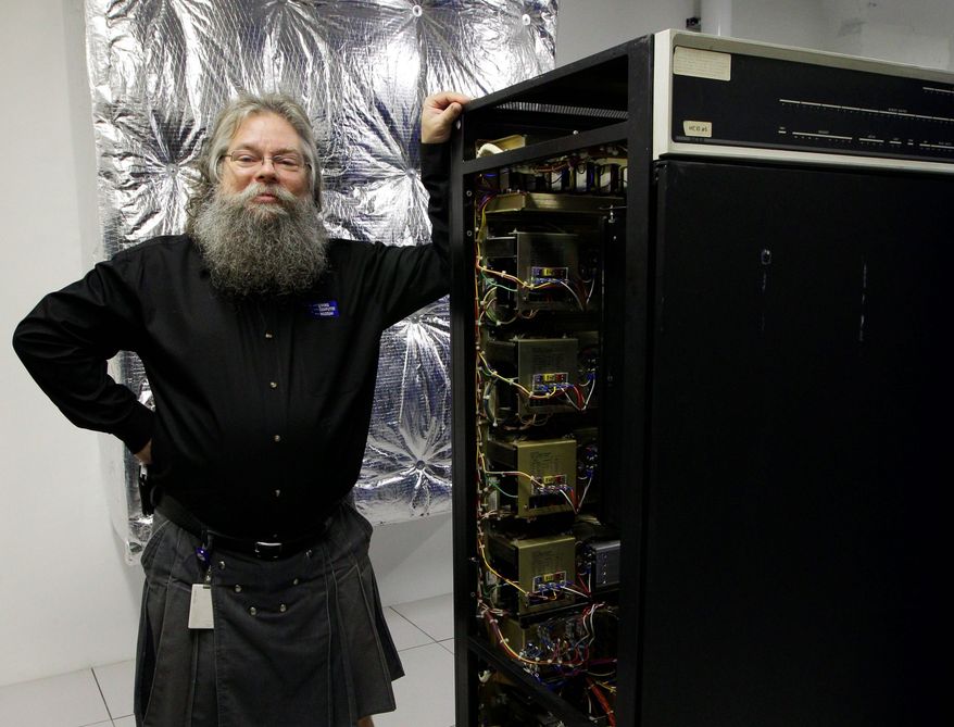 Ian King, senior vintage systems engineer at the Living Computer Museum in Seattle, stands by a memory module of an early 1970s computer with 16 kilobytes of memory. (Associated Press)