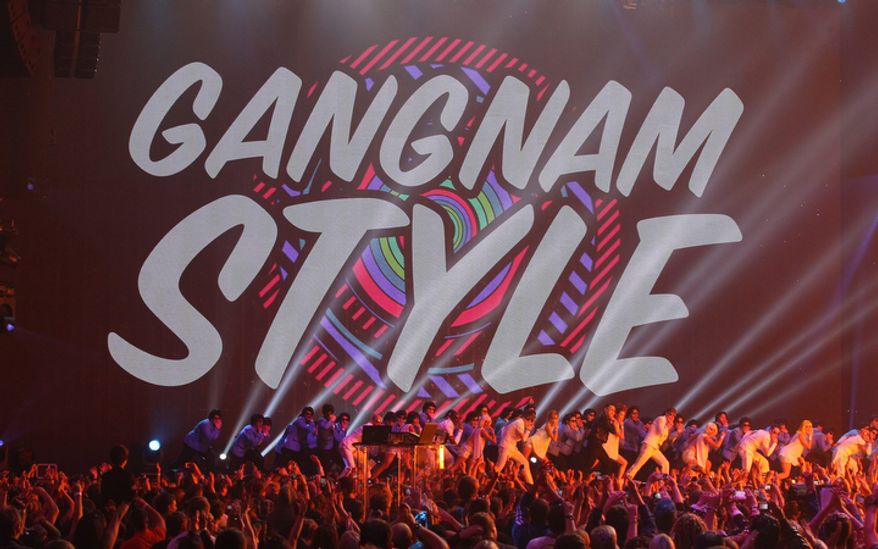 South Korean Psy performs during the 2012 MTV European Music Awards show at the Festhalle in Frankfurt, central Germany, Sunday, Nov. 11, 2012. (AP Photo/Michael Probst)