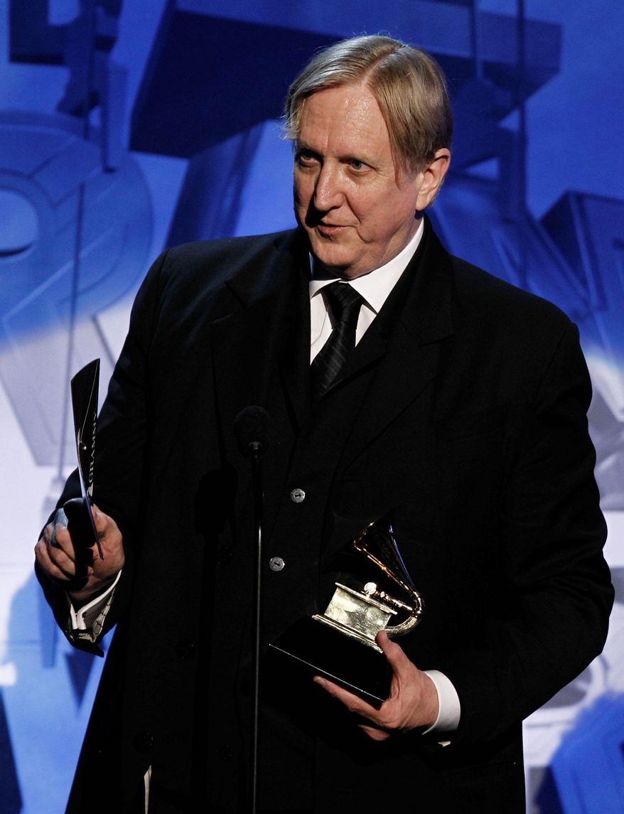 T-Bone Burnett accepts the award for best compilation soundtrack album during the pre-telecast at the 53rd annual Grammy Awards on Sunday, Feb. 13, 2011, in Los Angeles. (AP Photo/Matt Sayles)
