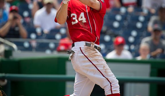 Nationals Bryce Harper flies out in the bottom of the fifth inning as the Washington Nationals host the Colorado Rockies at Nationals Park in Washington, D.C., Sunday, July 8, 2012. (Rod Lamkey Jr./The Washington Times)