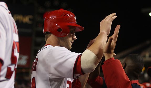 Washington Nationals center fielder Bryce Harper (34) celebrates after scoring the tying run in the eight inning, Wednesday, Sept. 19, 2012, in Washington, DC. Washington Nationals lose to the Los Angeles Dodgers 6 to 7 in the second game of the doubleheader at National Park (Craig Bisacre/The Washington Times)