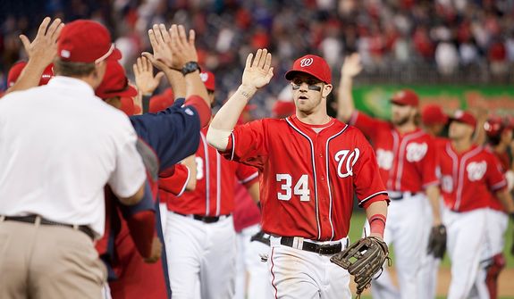 Washington Nationals center fielder Bryce Harper (34) celebrates after beating the Los Angeles Dodgers in the first game of a doubleheader at National Park,Wednesday, Sept. 19, 2012, in Washington, DC. Washington Nationals won 3-1 (Craig Bisacre/The Washington Times)