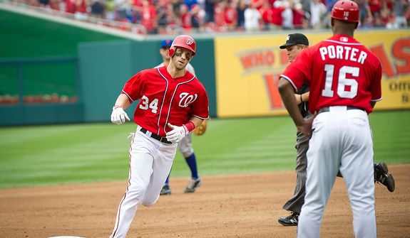 Washington Nationals Bryce Harper makes his way around third base after his solo home run in the bottom of the fifth inning as the Washington Nationals host the New York Mets at Nationals Park in Washington, D.C., Sunday, August 19, 2012. The Nationals defeated the Mets 5-2. (Rod Lamkey Jr./The Washington Times)