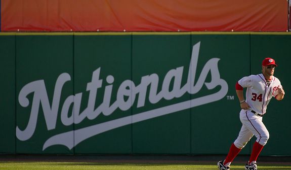 Washington Nationals right fielder Bryce Harper (34) runs sprints in the outfield following a game between the Washington Nationals and the Houston Astros during spring training at Space Coast Stadium, Viera, Fla., Sunday, March 4, 2012. The Nationals lost to the Asros 10-2. (Andrew Harnik/The Washington Times)