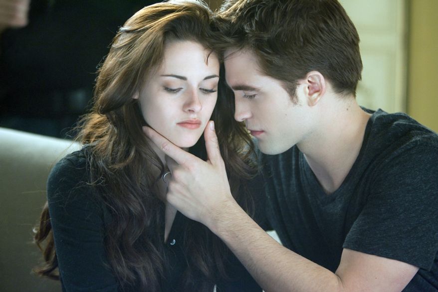 This film image released by Summit Entertainment shows Kristen Stewart, left, and Robert Pattinson in a scene from "The Twilight Saga: Breaking Dawn Part 2." (AP Photo/Summit Entertainment, Andrew Cooper)