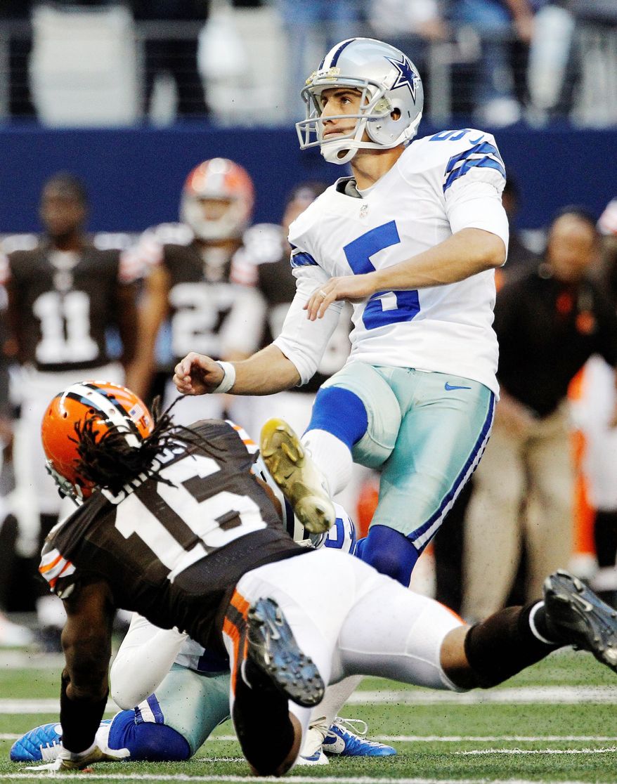 Dallas kicker Dan Bailey follows through on a 32-yard field goal with 2 seconds left in regulation. Bailey hit from 38 yards in overtime to seal a 23-20 comeback victory over Cleveland. (Associated Press)