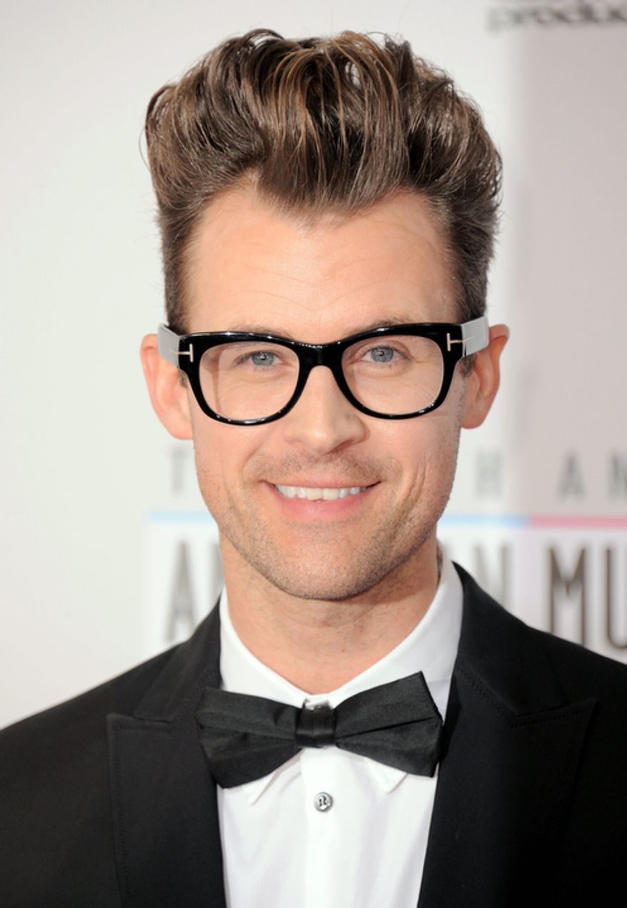 Stylist and TV personality Brad Goreski arrives at the 40th Anniversary American Music Awards on Sunday Nov. 18, 2012, in Los Angeles. (Photo by Jordan Strauss/Invision/AP)