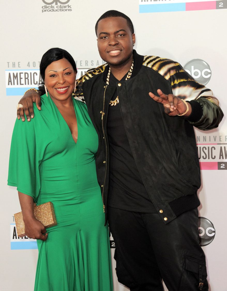 Sean Kingston, right, and his mother Janice Turner arrive at the 40th Anniversary American Music Awards on Sunday Nov. 18, 2012, in Los Angeles. (Photo by Jordan Strauss/Invision/AP)