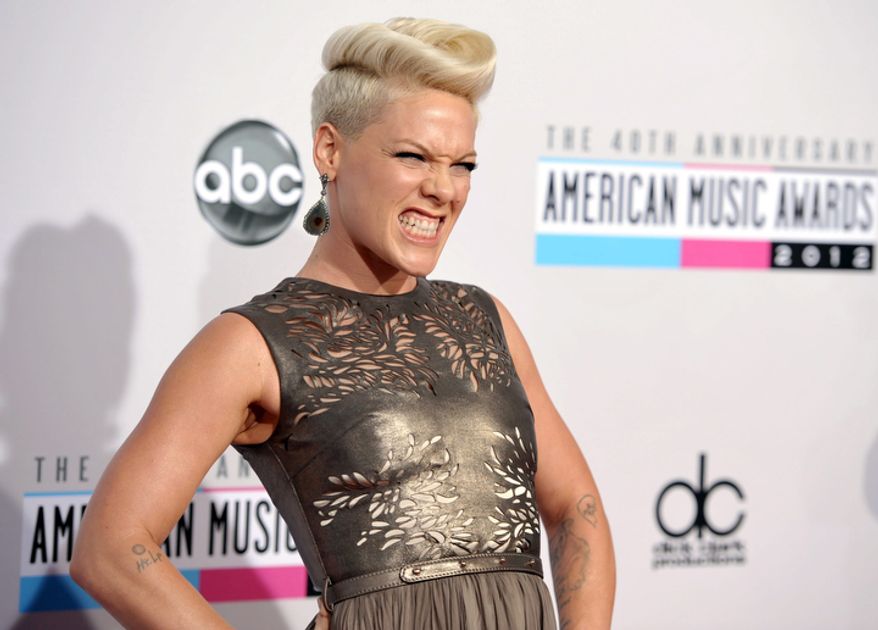 Pink arrives at the 40th Anniversary American Music Awards on Sunday, Nov. 18, 2012, in Los Angeles. (Photo by John Shearer/Invision/AP)