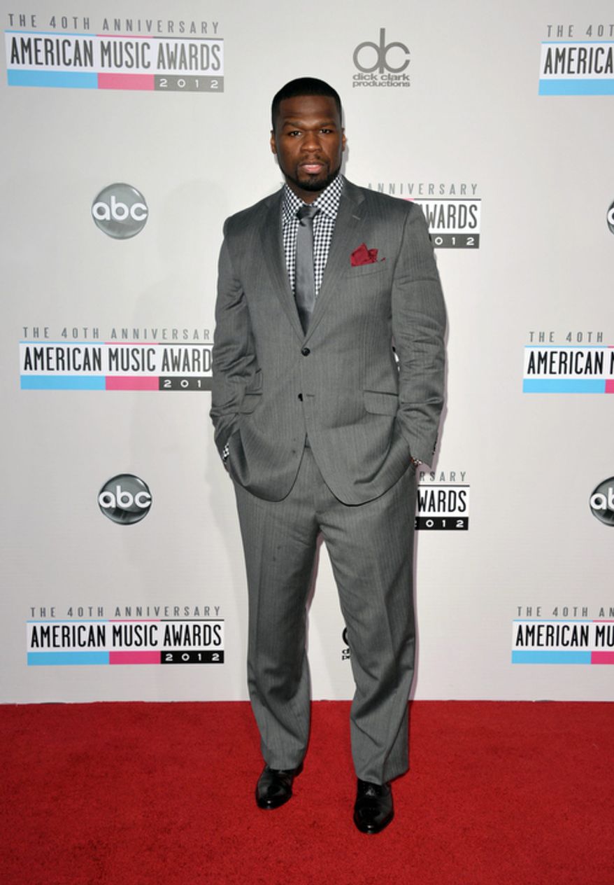 50 Cent arrives at the 40th Anniversary American Music Awards on Sunday, Nov. 18, 2012, in Los Angeles. (Photo by John Shearer/Invision/AP)