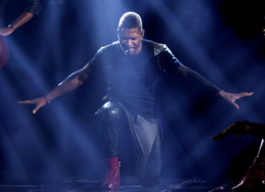 ** FILE ** Usher performs at the 40th Annual American Music Awards on Sunday, Nov. 18, 2012, in Los Angeles. (Photo by Matt Sayles/Invision/AP)